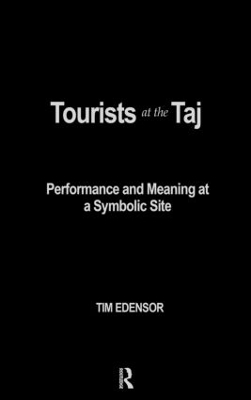 Tourists at the Taj book