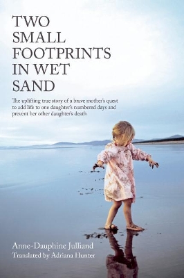 Two Small Footprints in Wet Sand by Anne-Dauphine Julliand