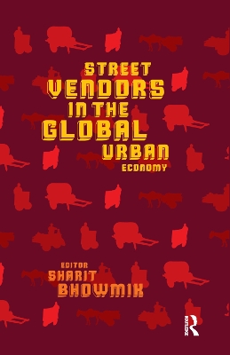 Street Vendors in the Global Urban Economy by Sharit Bhowmik