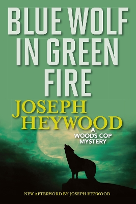 Blue Wolf In Green Fire: A Woods Cop Mystery by Joseph Heywood