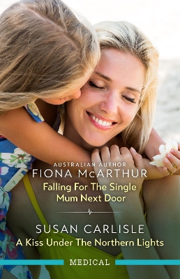 Falling For The Single Mum Next Door/A Kiss Under The Northern Lights book