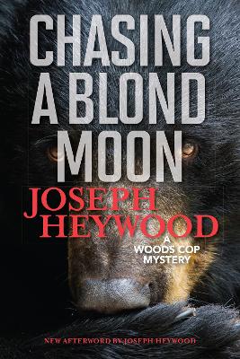 Chasing a Blond Moon: A Woods Cop Mystery book