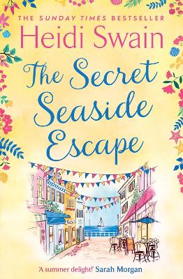 The Secret Seaside Escape: Enjoy the summer holidays with this heart-warming, feel-good romance from the Sunday Times bestseller! book