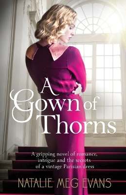 A Gown of Thorns: A gripping novel of romance, intrigue and the secrets of a vintage Parisian dress book